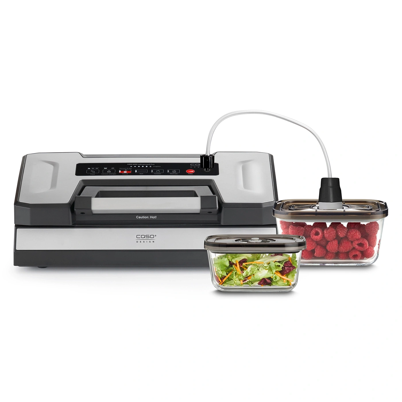 Vakuumiergerät mit Behältern, gefüllt mit Himbeeren und Salat.